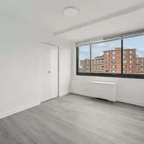 A Spacious Room With City View Window