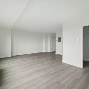 A Spacious Room With White Walls