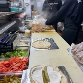 Shawarma prep line with fresh ingredients at Bucharest Grill Detroit MI