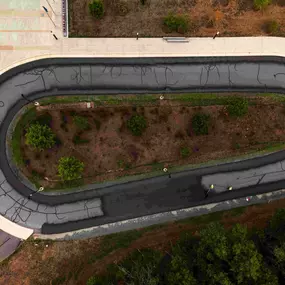 Sealcoating a road for Loudoun Country Public Schools