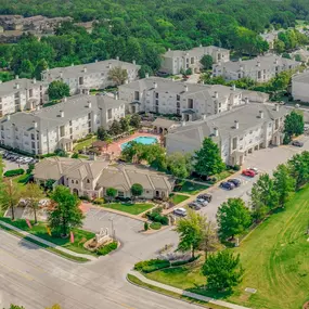 View of Large apartment complex with a pool in the middle