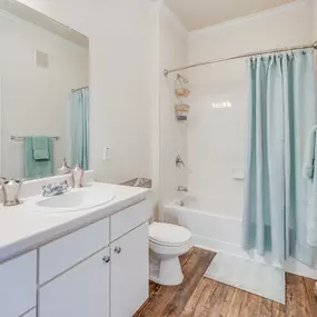 Bathroom With Extra Storage Space and a shower