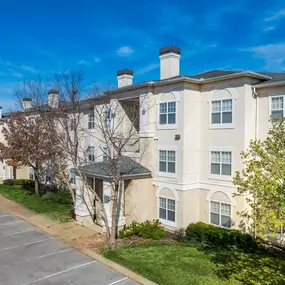 Exterior of apartment with trees in front
