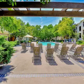 Pool area with lounge chairs