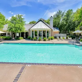 One of two pools with lush landscaping