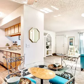 Living room with blue chairs and sofa