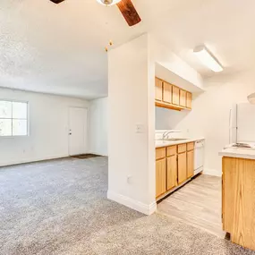 Open concept kitchen with view of living room and dining room