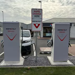 InstaVolt charging bays located outside Domino’s Pizza at Pensnett Trading Estate in Kingswinford, ideal for a quick charge and food stop.