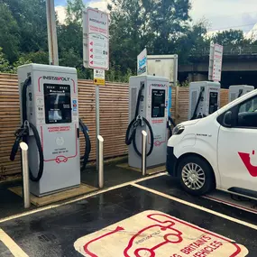 Multiple InstaVolt chargers in active use at Grantham Squash & Fitness Club. The area offers contactless payment, clear signage, and quick access to local roads for easy charging.