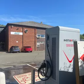 Close-up of an InstaVolt charging unit next to Grantham Squash & Fitness Club. The facility provides fast, convenient EV charging near Harlaxton Road and the A1.