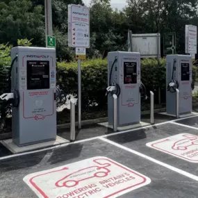 A row of InstaVolt ultra-rapid electric vehicle chargers with clearly marked bays located at Grantham Squash & Fitness Club, just off the A1. Ideal for convenient charging on the go.