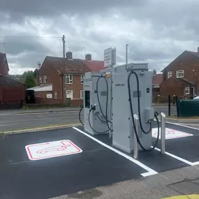 InstaVolt ultra rapid EV charging point in Upper Gornal, Dudley, with marked bays in a residential setting for convenient top-ups.