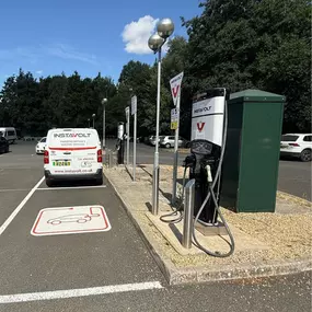 InstaVolt’s rapid chargers at Bannatyne Health Club & Spa in Banbury, with a branded van onsite.