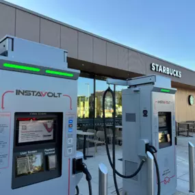Two InstaVolt ultra-rapid chargers located directly outside the Starbucks on Gatwick Road, offering convenient EV charging with contactless payment.