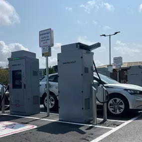 Detailed view of InstaVolt’s ultra rapid EV charging station in use, situated in the heart of Teanlowe Shopping Centre’s car park in Poulton-le-Fylde.