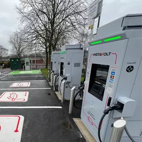 A detailed look at InstaVolt’s user-friendly ultra-rapid chargers, featuring contactless payment, clear instructions, and marked bays to ensure easy access for EV drivers.