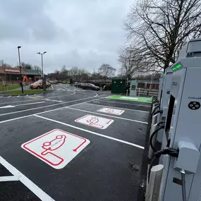 Spacious InstaVolt charging area at McDonald’s Penn Road, Wolverhampton, showing multiple ultra-rapid chargers, green accessible bays, and easy site navigation for EV users.