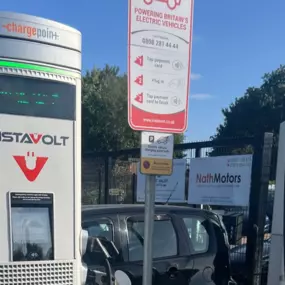 Rapid InstaVolt chargers set up for easy access and fast charging, with visible instructions and branding.