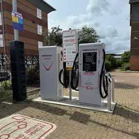 InstaVolt EV charging point in Stockton-On-Tees with signage and dual charging units near Christine House.