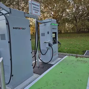 Side view of InstaVolt ultra-rapid EV chargers at Moat Sole, Sandwich, providing reliable charging near The Co-Operative Food