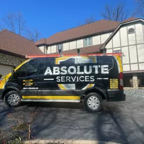 Absolute Services van outside of the house