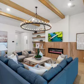 Great room with generous ceiling heights and cozy fireplace