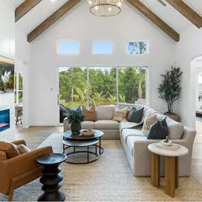 Soaring high ceilings and ample natural light connect indoor-outdoor living