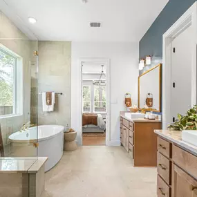 Spa-inspired bathrooms with dual sinks, expansive showers and soaking tubs