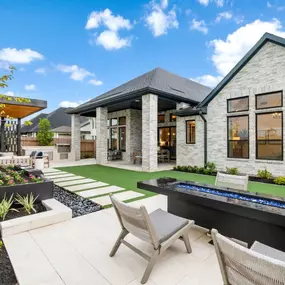 Backyard with covered patio designed to maximize indoor/outdoor living