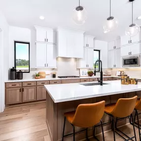 Beautiful kitchen with stainless steel appliances, gorgeous countertops, and ample cabinet space