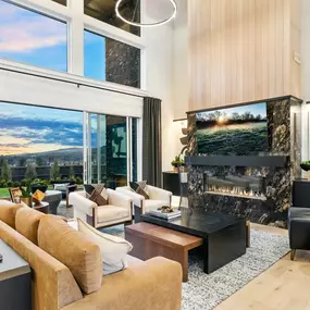 Stunning 2-story great room with stacked doors to covered patio