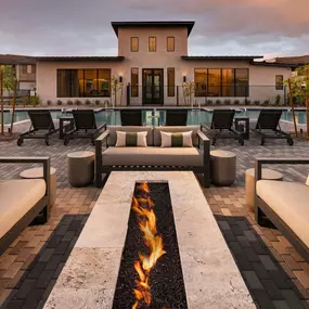 Fire pit for community use conveniently located behind the pool
