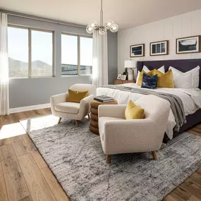 Primary bedroom suite with beautiful floors and striking accent wall