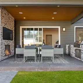 Covered patio with optional gas fireplace and BBQ cooking area