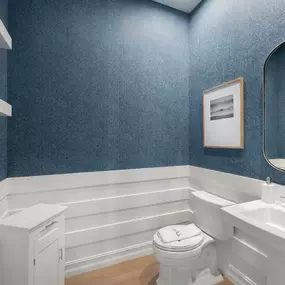 Convenient powder rooms just off the main entry