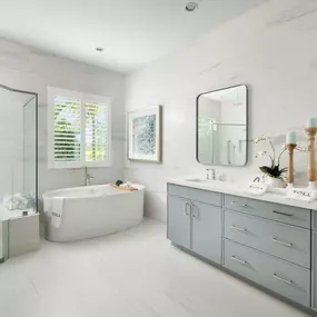 Spa-like primary bathroom suites with dual-vanity sinks, free standing tubs, and walk-in closets