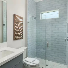 Secondary bathrooms offer guests luxury and convenience