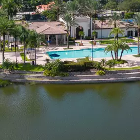 Junior Olympic-sized, heated swimming pool overlooks one of the many beautiful lake views within the community