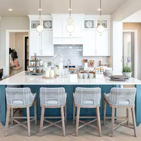 Large center islands with ample countertop and cabinet space