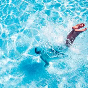 Relax by the pool at the clubhouse