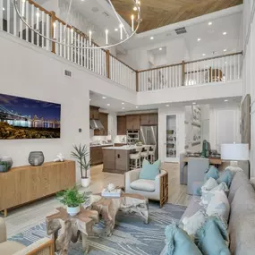 Expansive two-story great rooms just off the gourmet kitchen