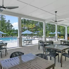 Enjoy socializing with neighbors on the poolside deck