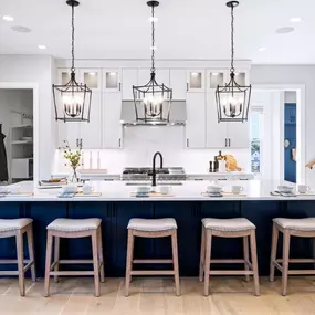 Kitchen boasts a large center island and a walk-in pantry