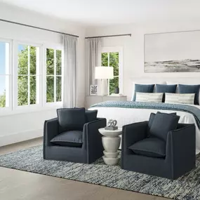 Serene primary bedroom suites boast dual walk-in closets