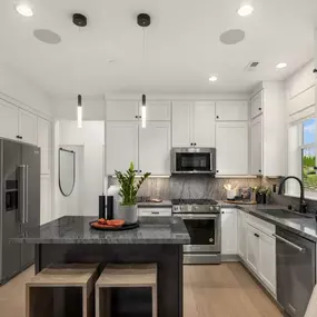 Double-stacked cabinets in the kitchen provide extra storage space