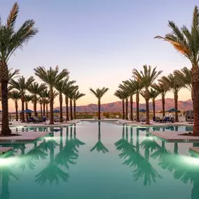 Resort-style pool with golf course and mountain views