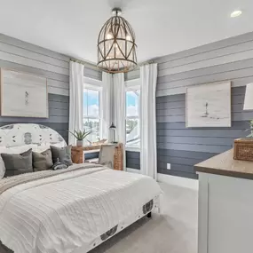 Generous secondary bathrooms with dual vanities