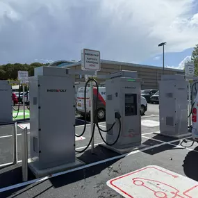 Multiple InstaVolt ultra-rapid EV chargers in a well-marked car park with visible signs and convenient access for electric vehicles.
