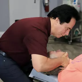 Dr. Dahmer adjusting a patient