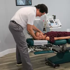 Dr. Dahmer adjusting a pediatric patient